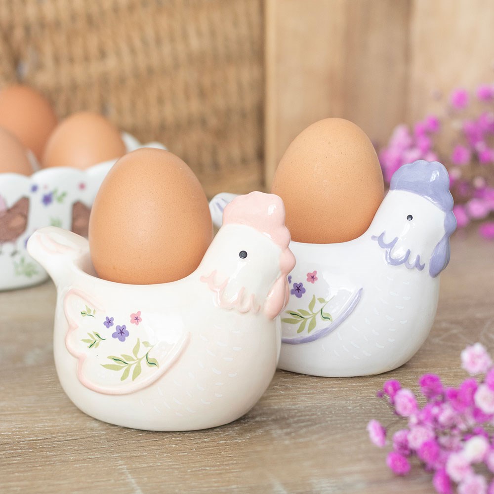 Sett med 2 blomstrete høne eggeglass