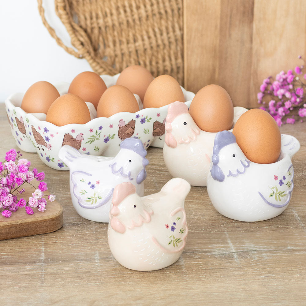 Sett med 2 blomstrete høne eggeglass